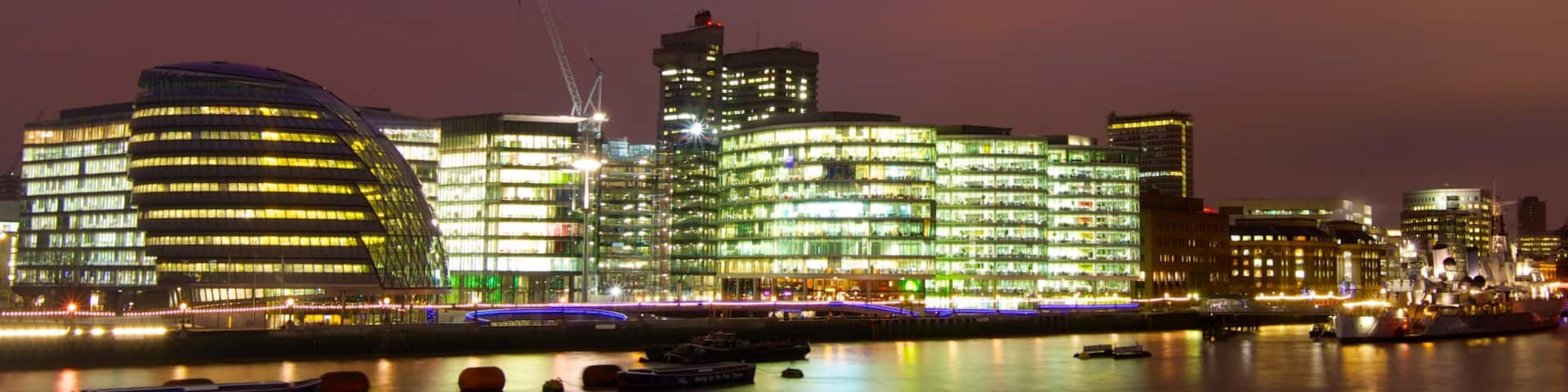 London City Hall which includes a city, a river or creek and night scenes