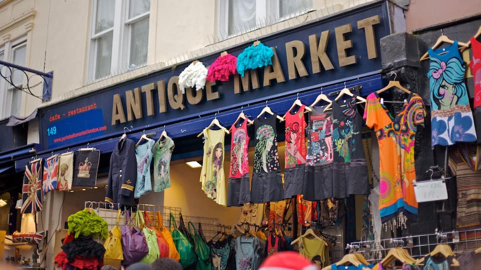 Notting Hill which includes markets, shopping and signage