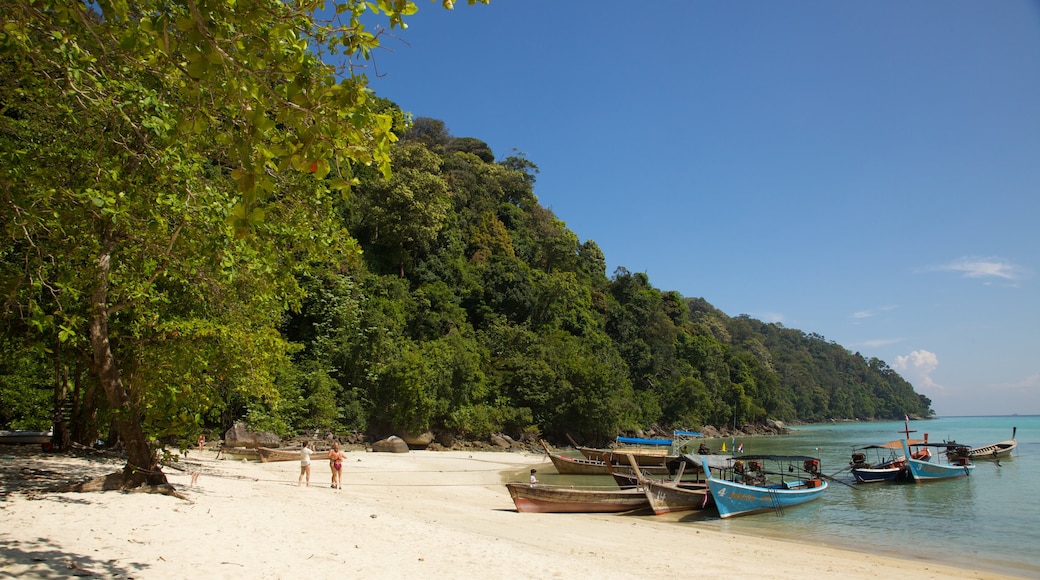 Ko Surin National Park which includes general coastal views, a sandy beach and boating