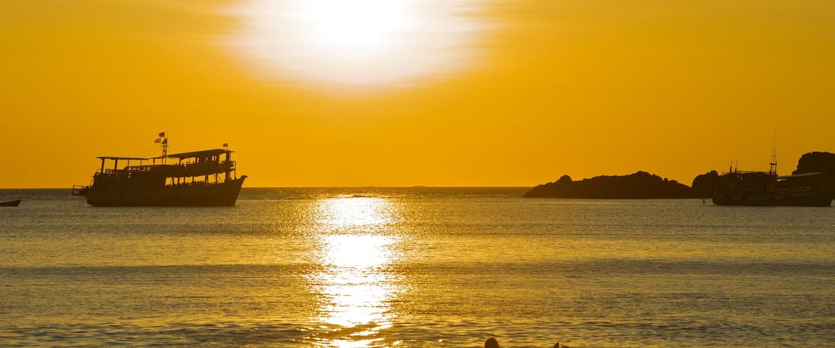 Thailand which includes boating, a sunset and general coastal views