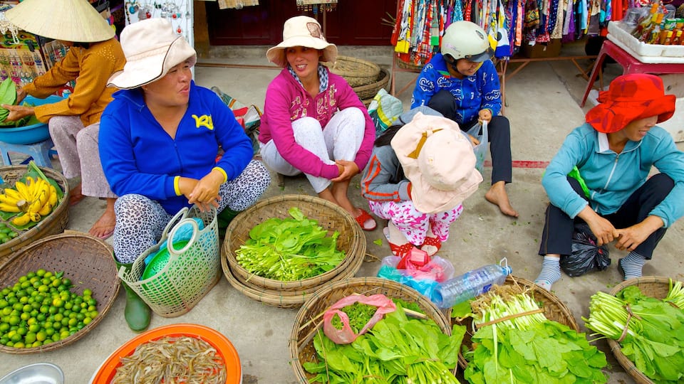 Central Market showing food and markets as well as a small group of people