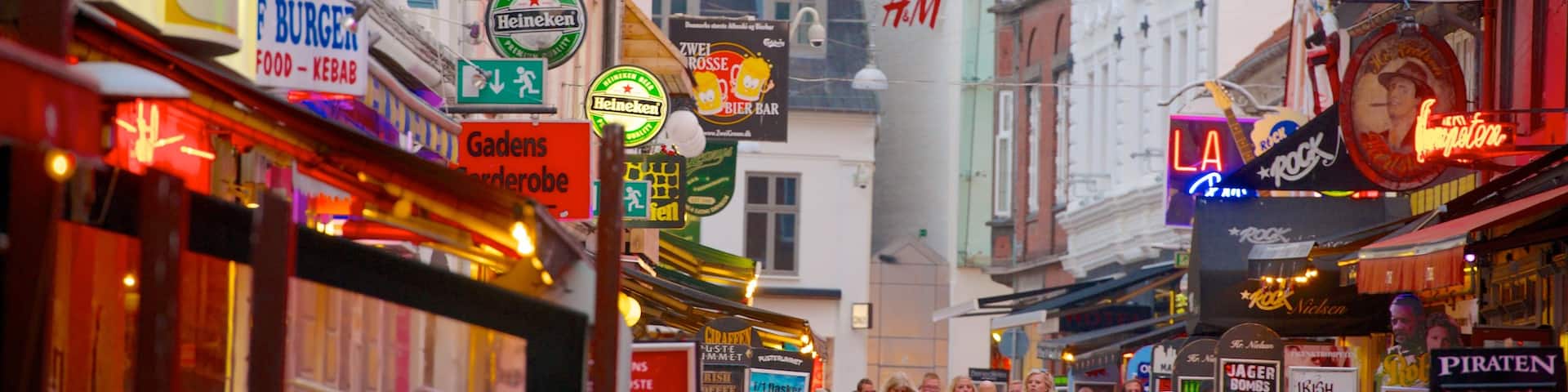 Jomfru Ane Gade which includes a city, signage and shopping