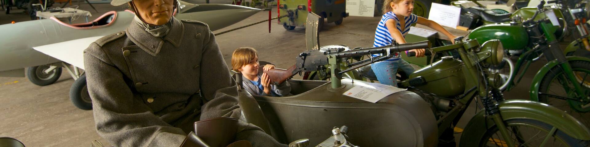 Defence and Garrison Museum featuring interior views as well as children