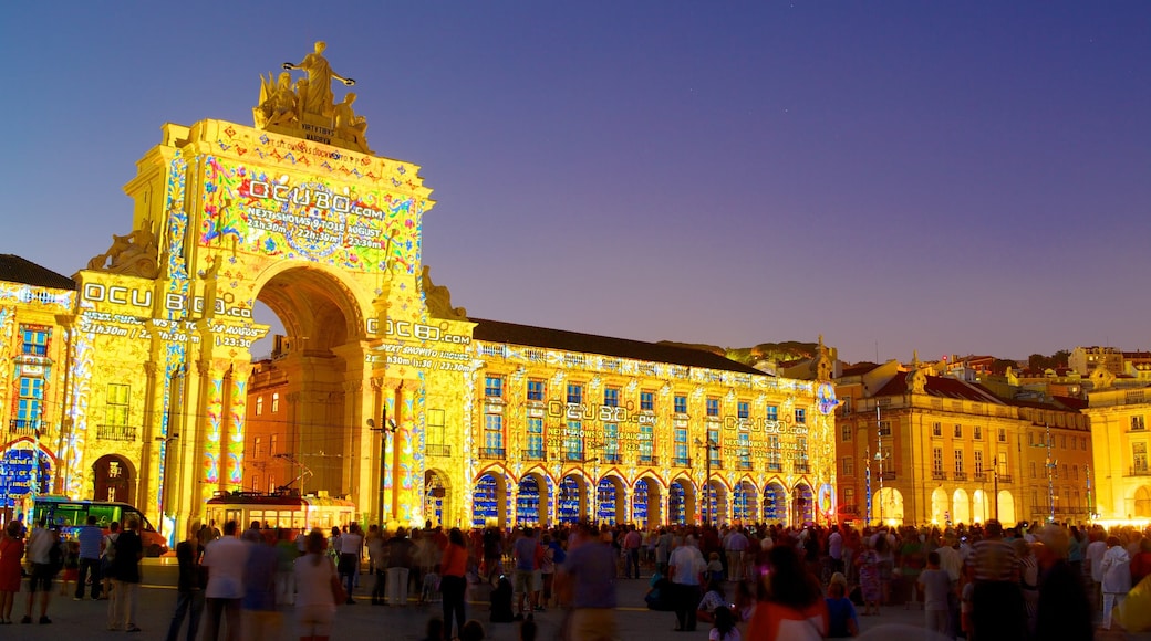 Commerce Square showing a city, night scenes and outdoor art