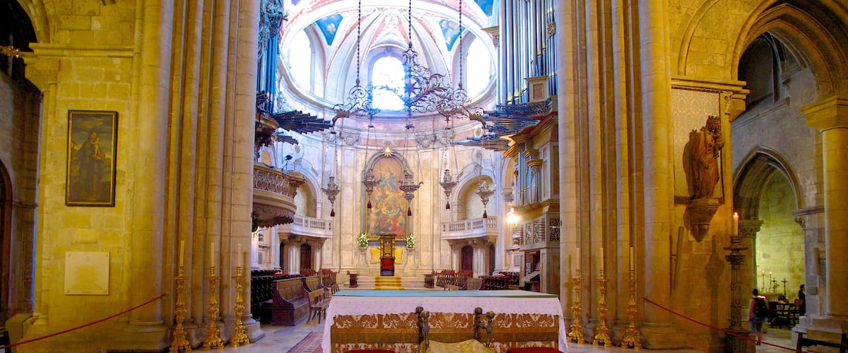 Lisbon Cathedral showing interior views, heritage architecture and religious elements
