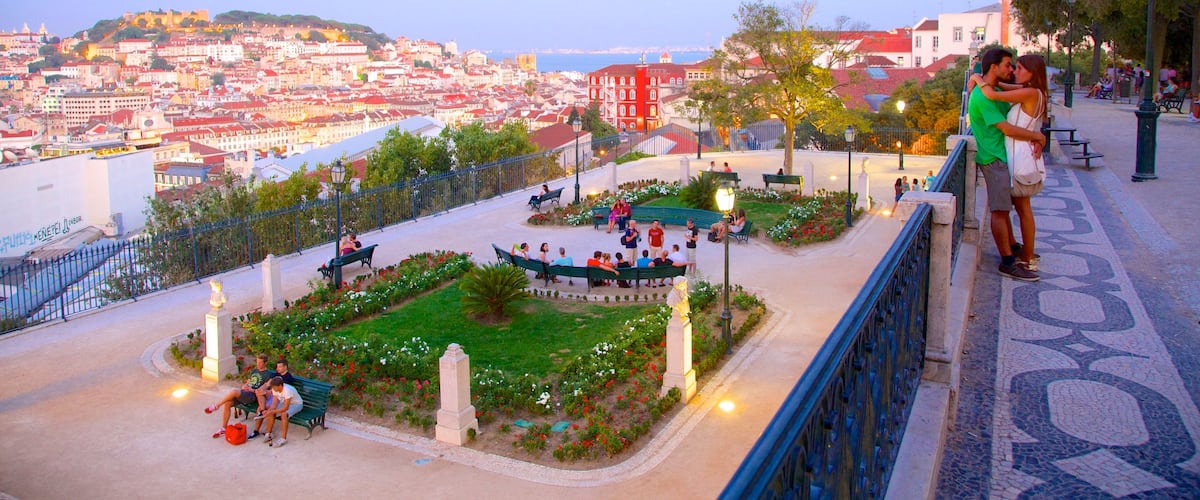 Chiado which includes views and a sunset as well as a couple
