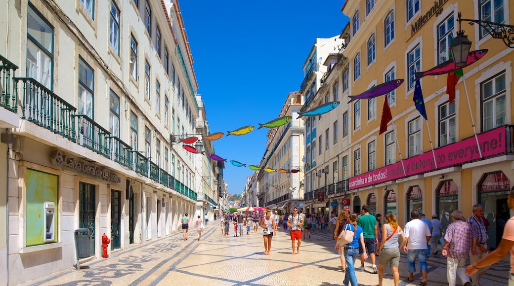 Lisbon featuring heritage architecture and a city as well as a large group of people