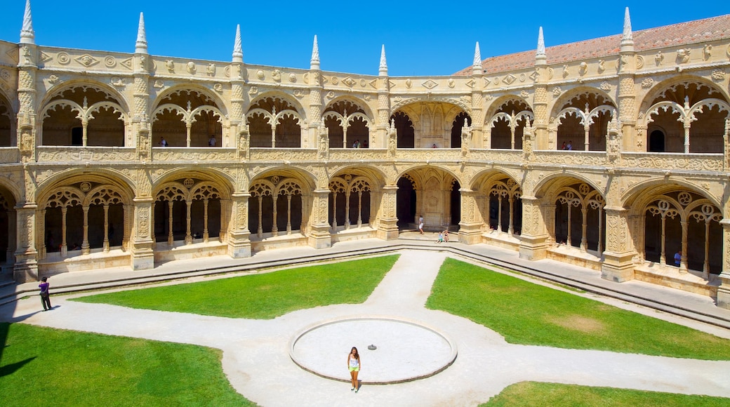 Jeronimos Monastery showing a church or cathedral, heritage architecture and a square or plaza