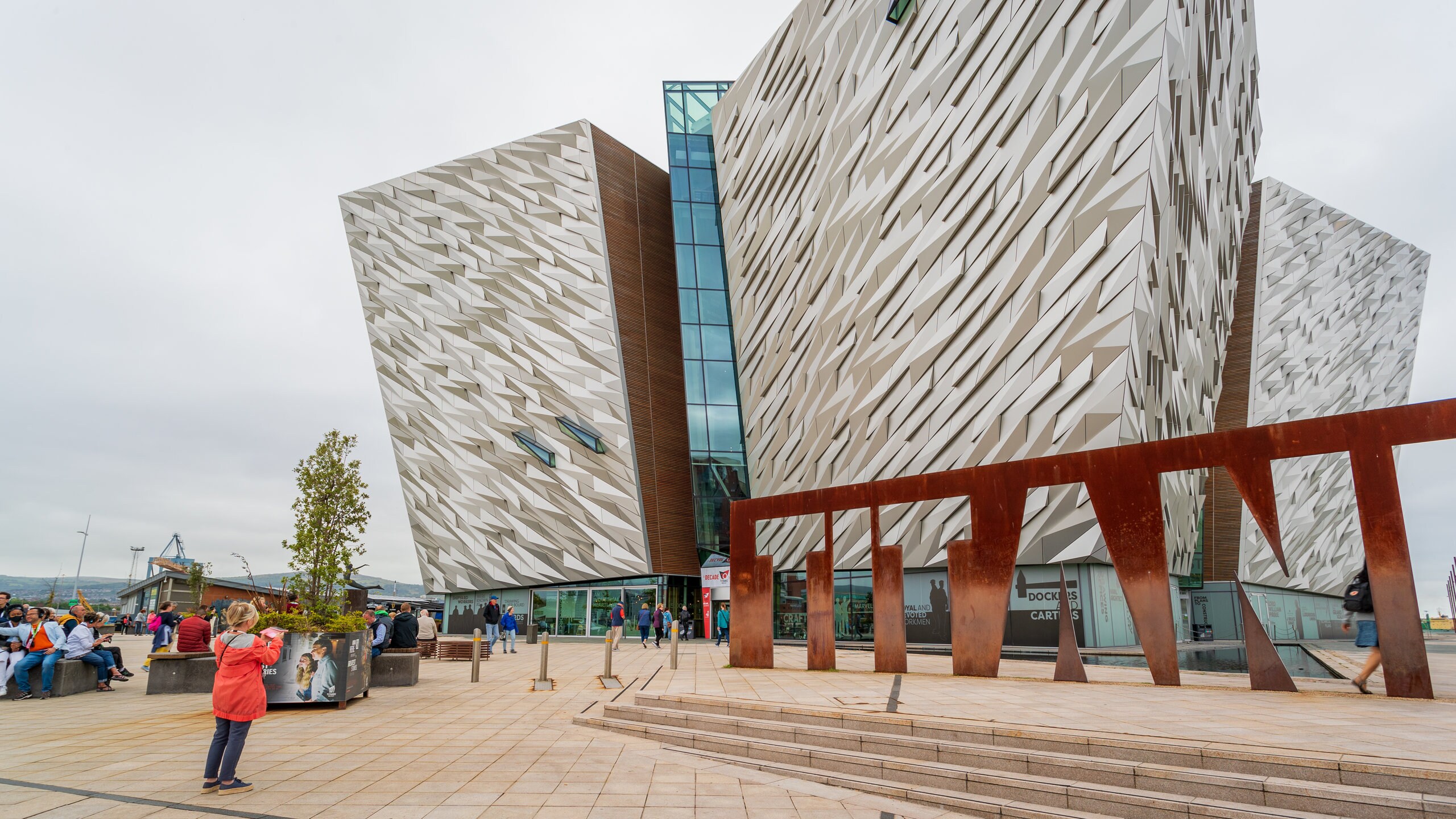 Titanic Belfast featuring street scenes and modern architecture as well as an individual child