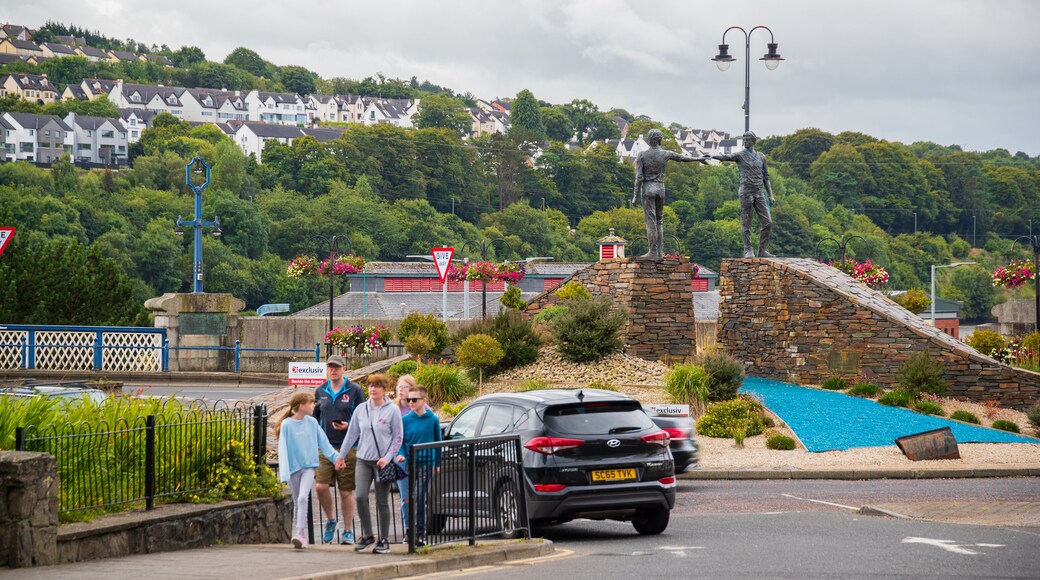 Hands Across the Divide showing street scenes as well as a family