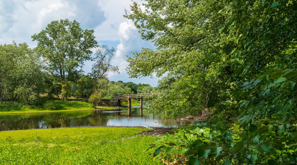 Old Manse featuring a river or creek and a garden