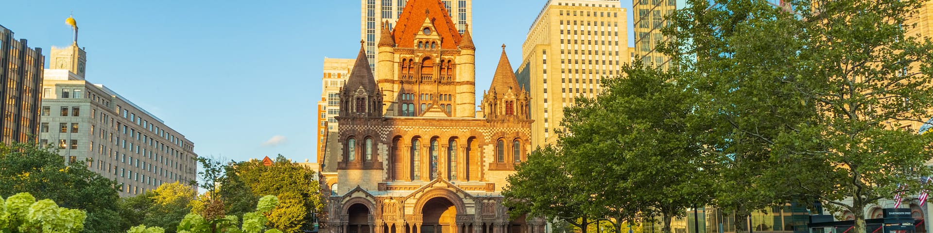 Copley Square showing a city, heritage architecture and flowers