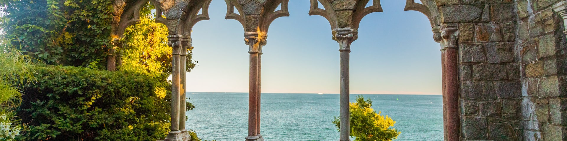 Hammond Castle which includes heritage elements, general coastal views and a sunset