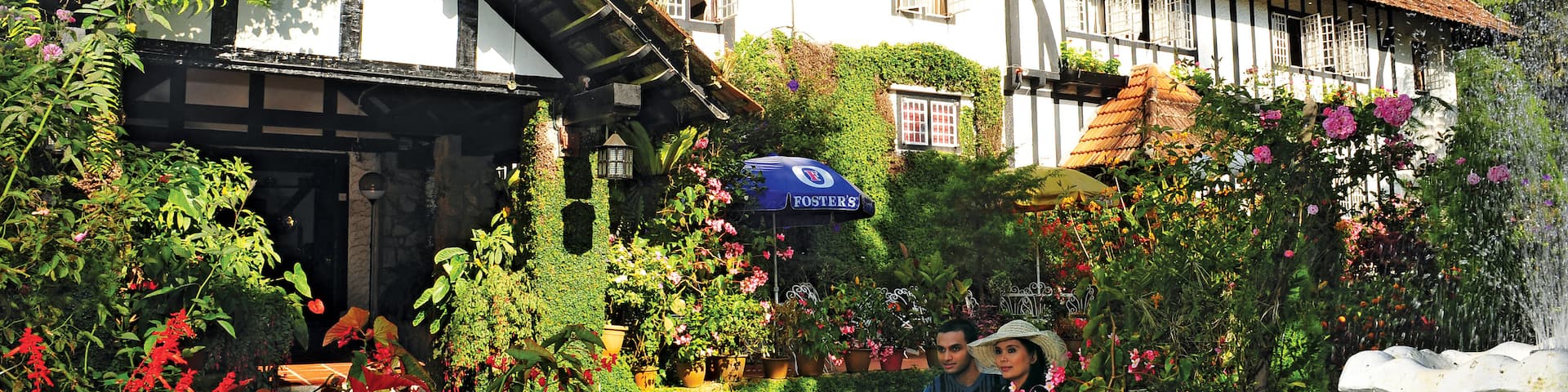 Cameron Highlands which includes wildflowers and a park as well as a couple