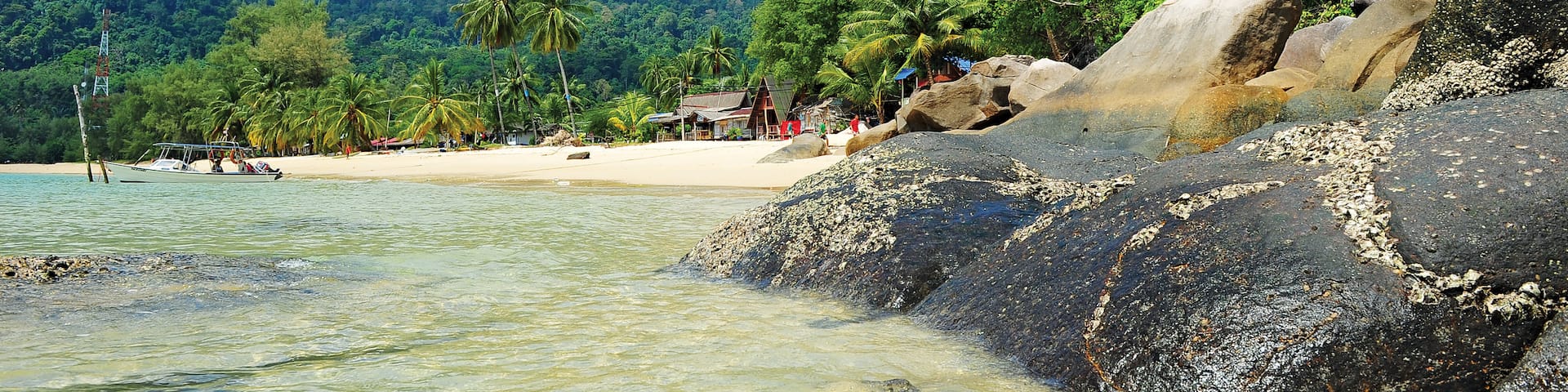 Johor Bahru which includes general coastal views, a sandy beach and tropical scenes