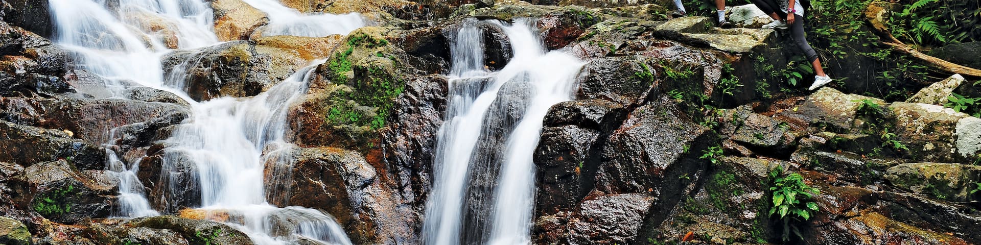 Johor Bahru which includes a river or creek, hiking or walking and a waterfall