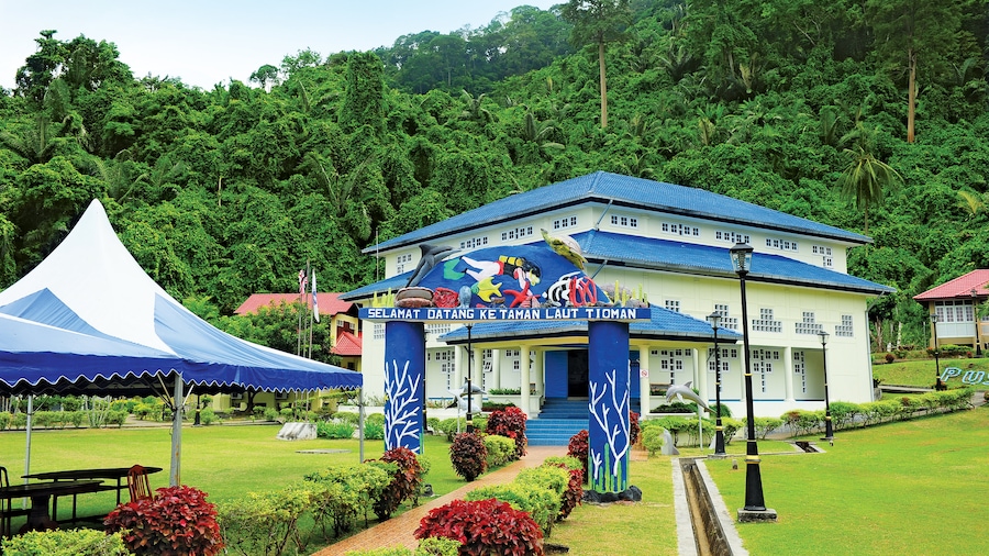 Tioman Island which includes signage and a park