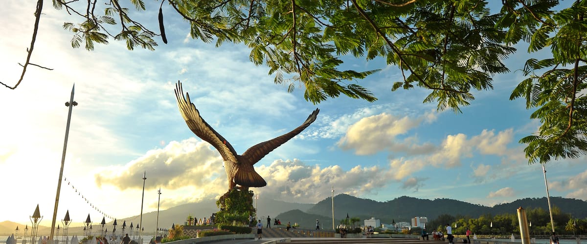 Langkawi featuring a sunset, a monument and street scenes