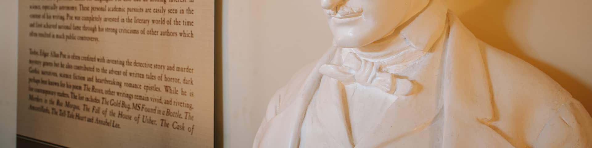 Edgar Allan Poe Museum and House showing a statue or sculpture