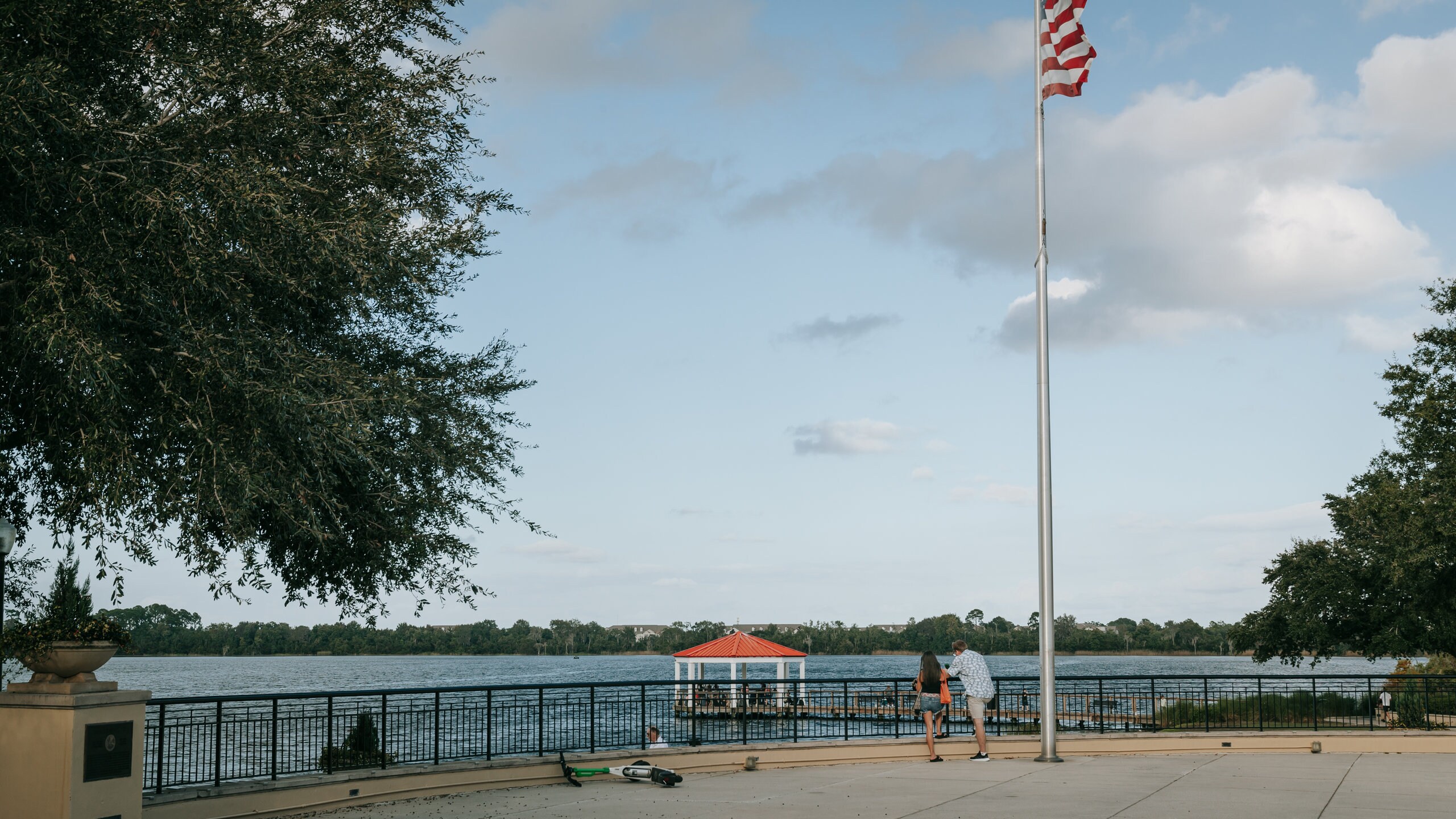 Orlando showing a lake or waterhole and views as well as a couple
