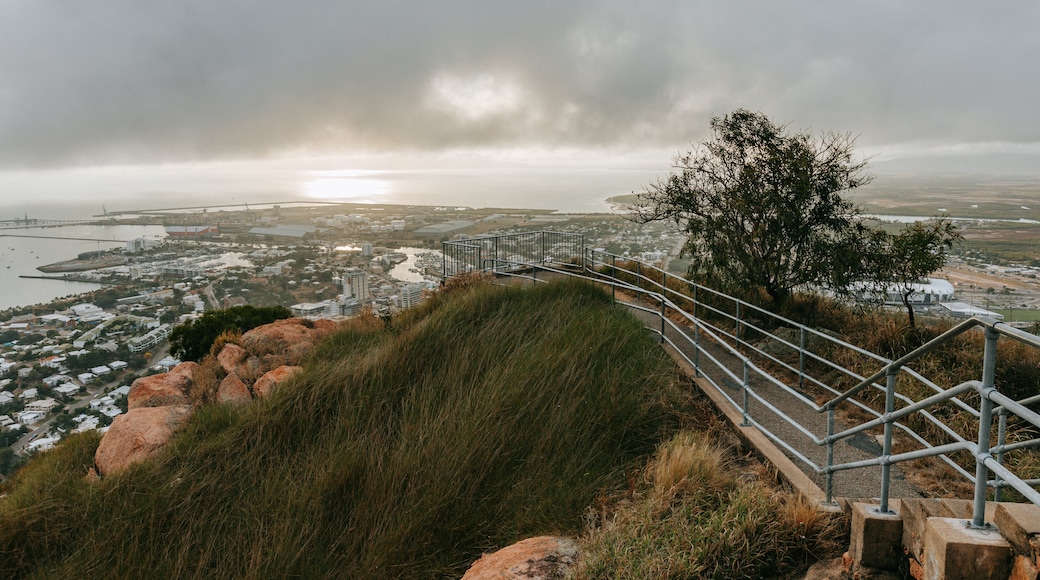 Castle Hill showing a sunset, landscape views and a coastal town