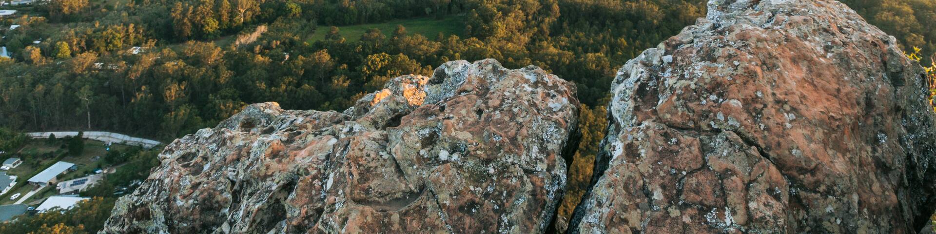 Mount Ngungun featuring landscape views, mountains and a sunset