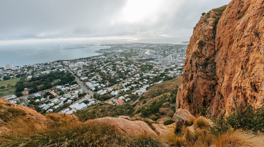 Castle Hill featuring landscape views, a coastal town and a sunset