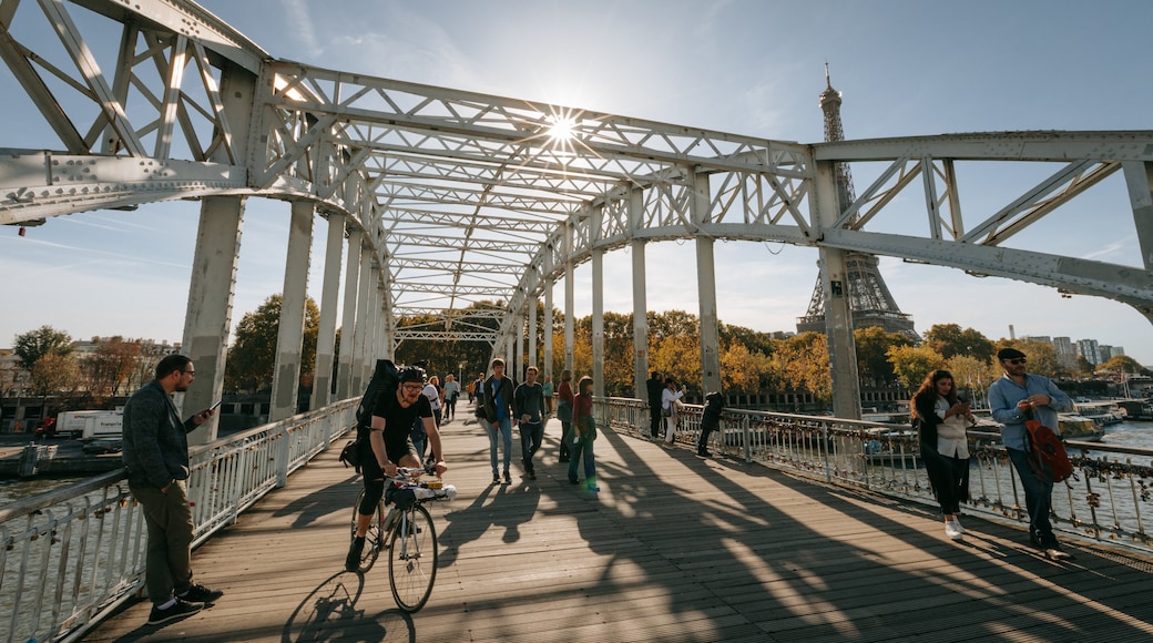 Passerelle Debilly featuring street scenes, a sunset and a bridge