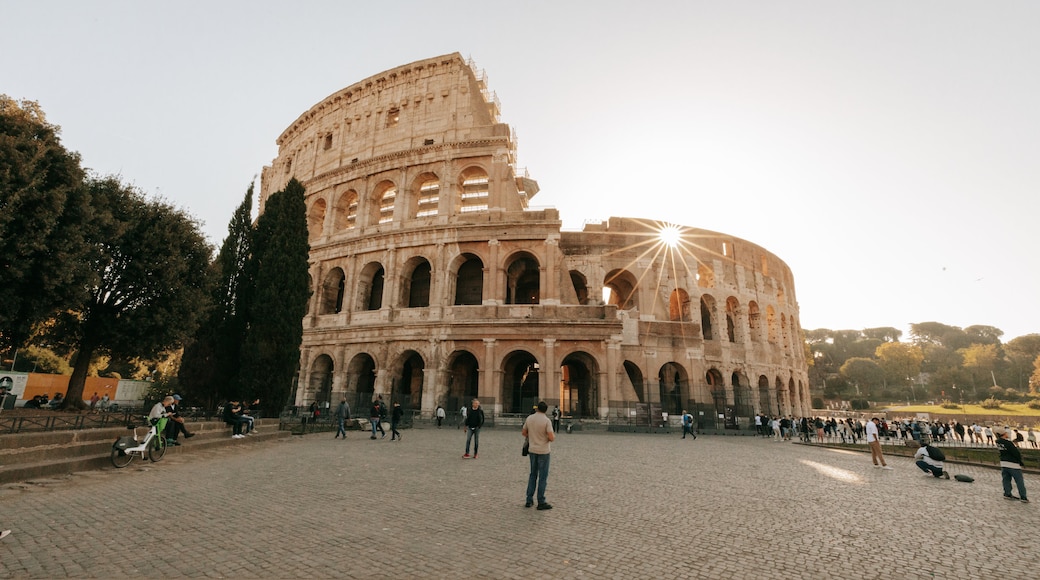 Colosseum featuring a sunset, heritage architecture and a monument