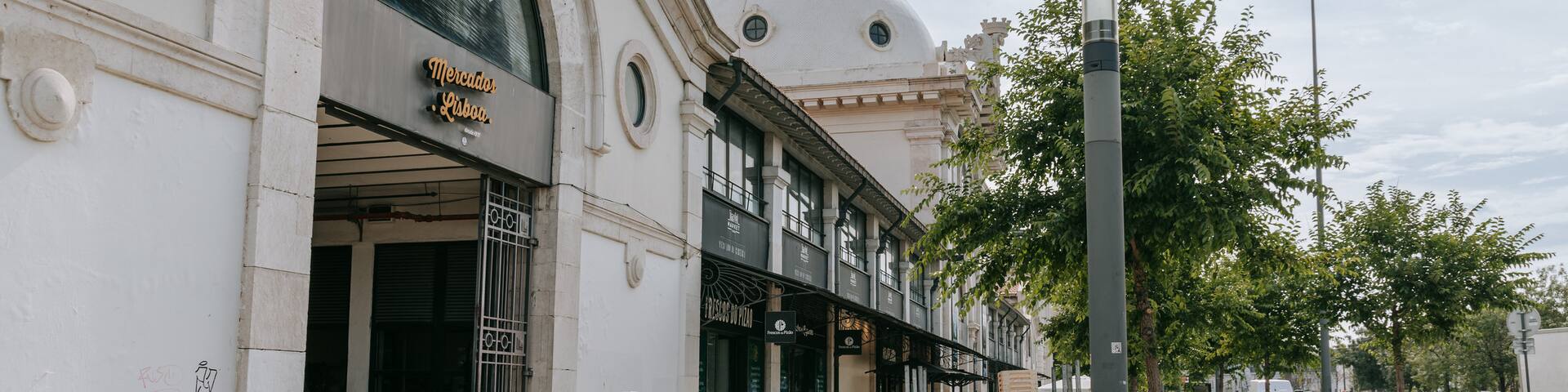 Mercado da Ribeira which includes street scenes as well as a couple