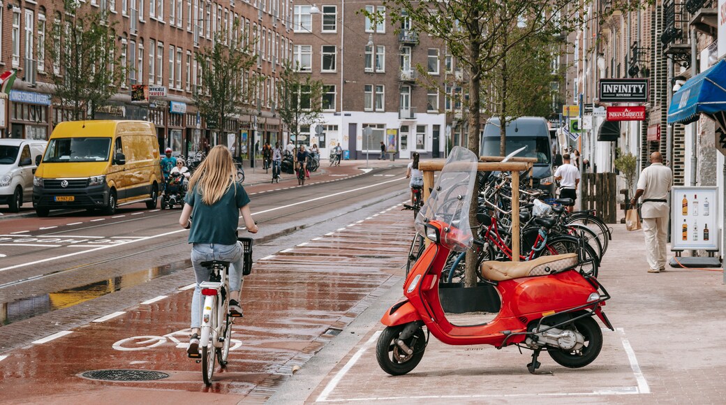 Van Lennepbuurt which includes cycling and street scenes as well as an individual femail