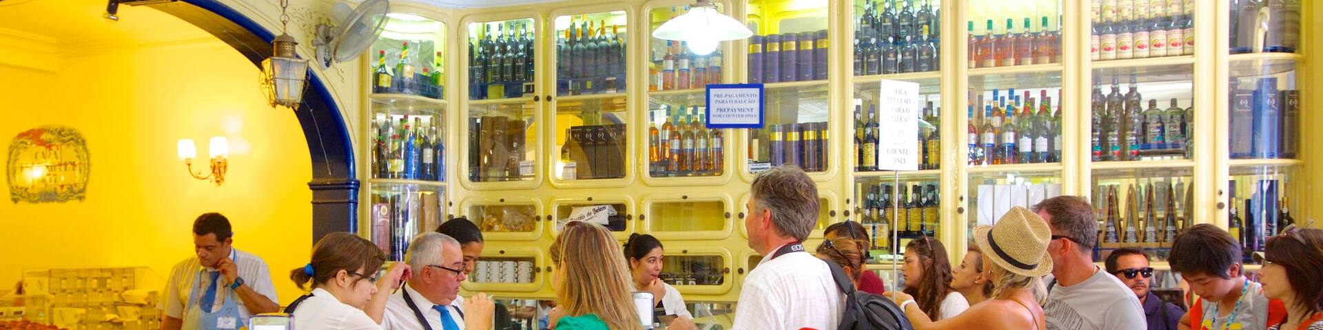 Pasteis de Belem showing cafe lifestyle and interior views as well as a large group of people