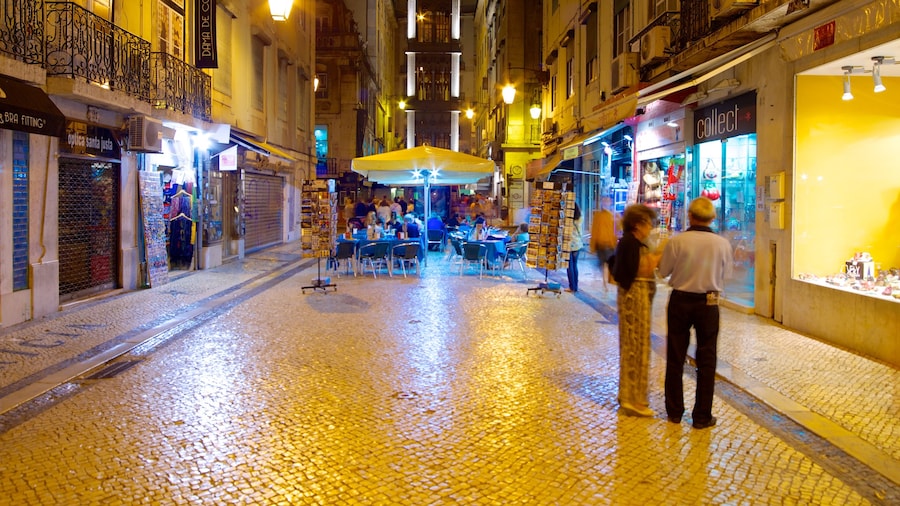 Elevador de Santa Justa ofreciendo vida nocturna, comer al aire libre y escenas nocturnas