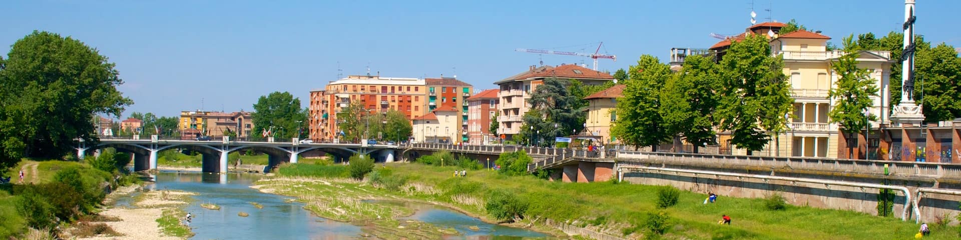 Parma showing a bridge and a river or creek