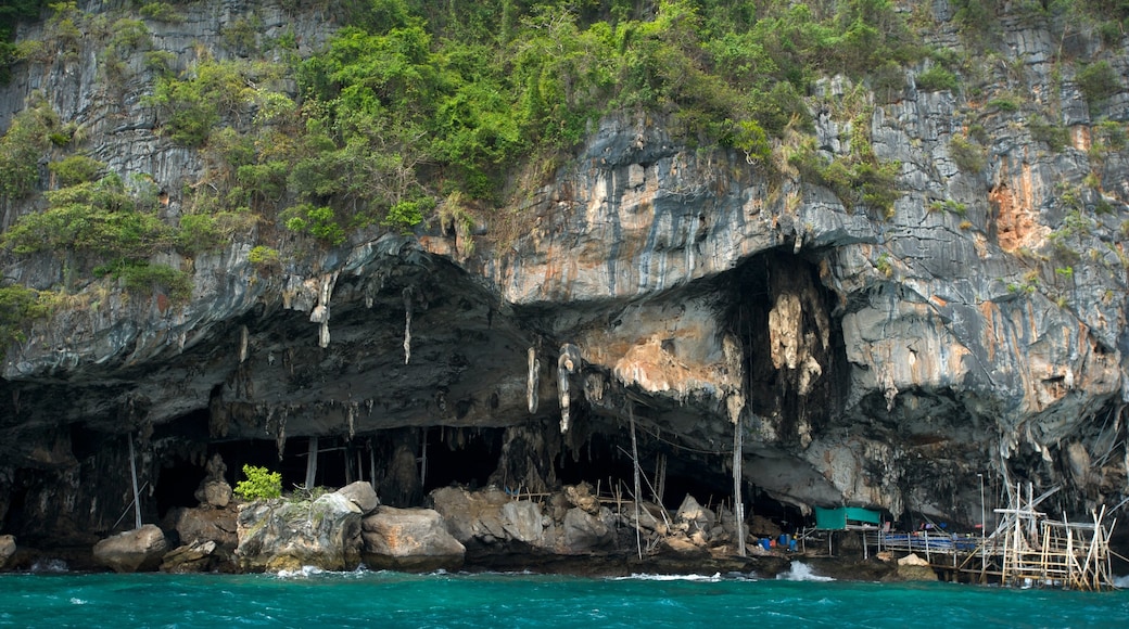 Maya Bay featuring rugged coastline, caves and a bay or harbour