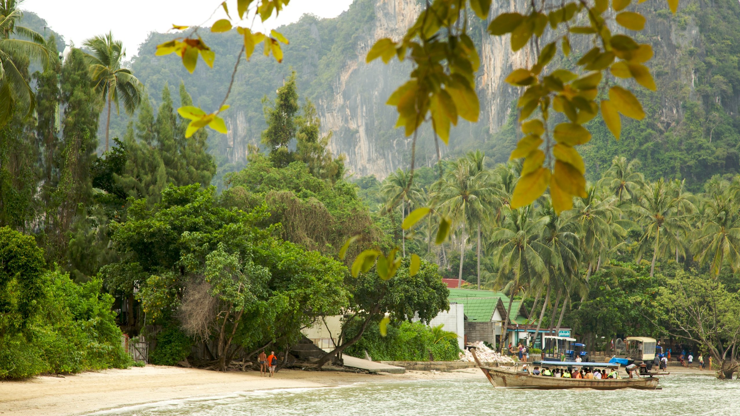 West Railay Beach featuring a sandy beach, boating and tropical scenes