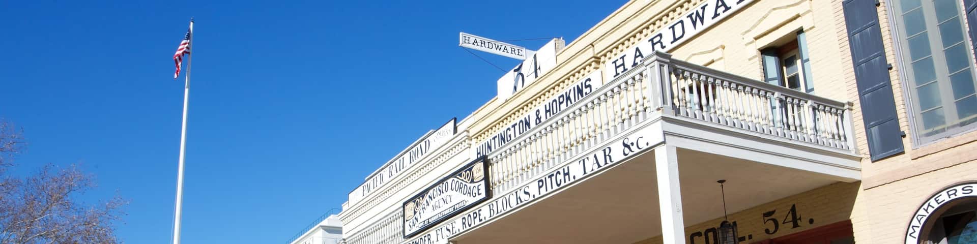 Old Sacramento featuring signage and heritage architecture