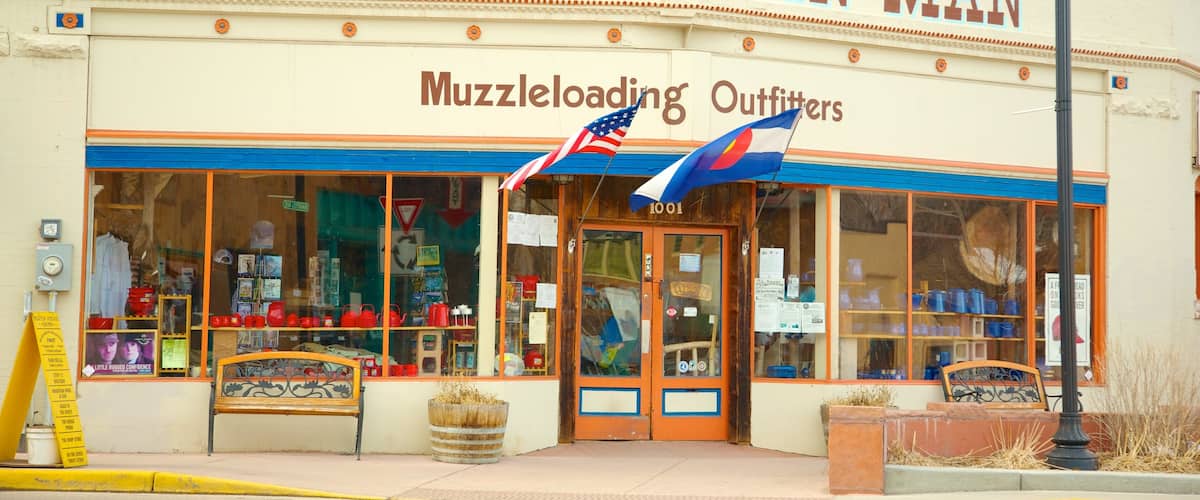 Manitou Springs which includes signage and a small town or village