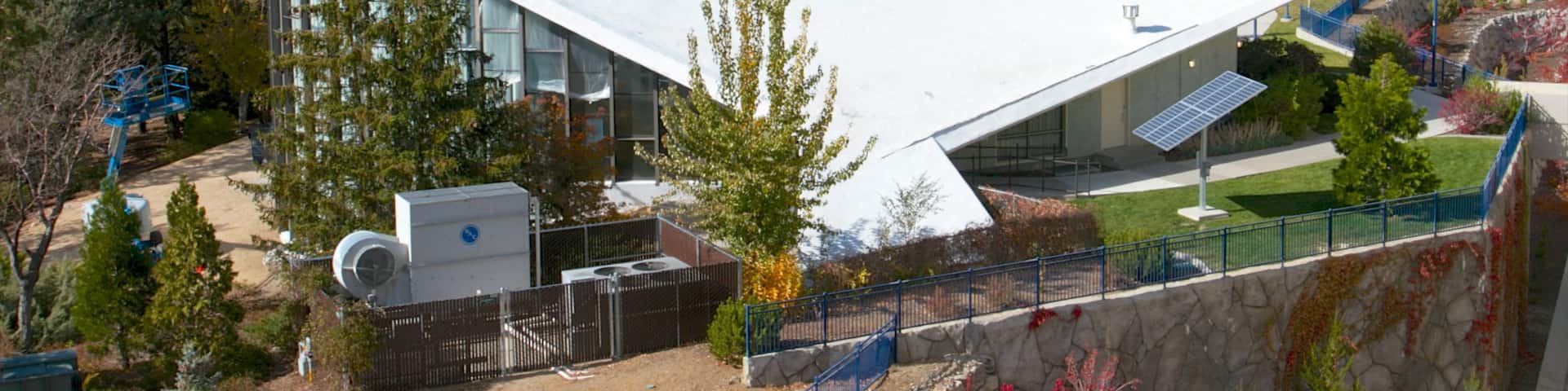 Fleischmann Planetarium and Science Center which includes modern architecture and fall colors