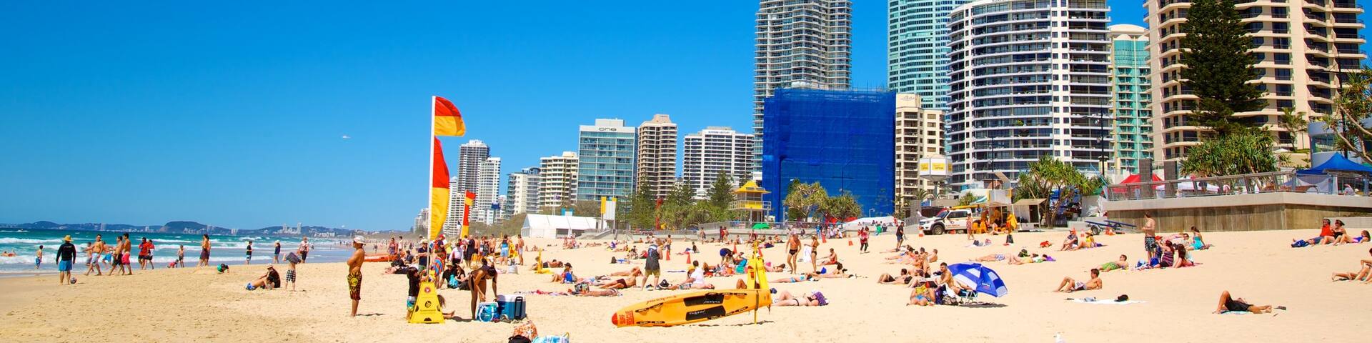 Surfers Paradise Beach featuring a sandy beach, modern architecture and skyline