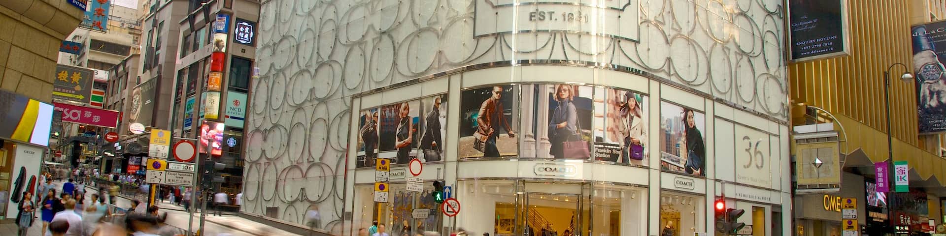 Lan Kwai Fong showing a city, signage and modern architecture