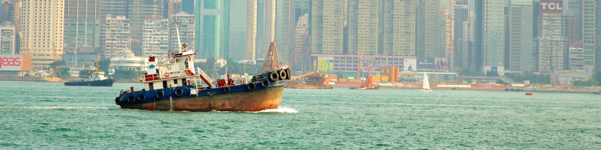 Tsim Sha Tsui Promenade which includes a bay or harbor, boating and city views