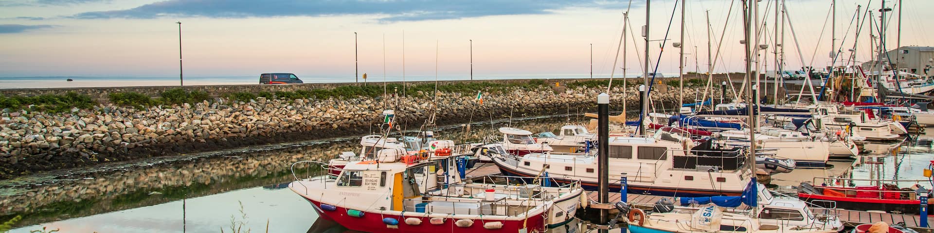 Kilmore showing a bay or harbor and a sunset