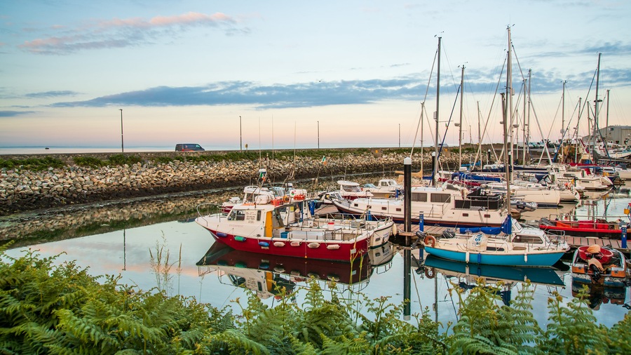 Kilmore showing a bay or harbor and a sunset
