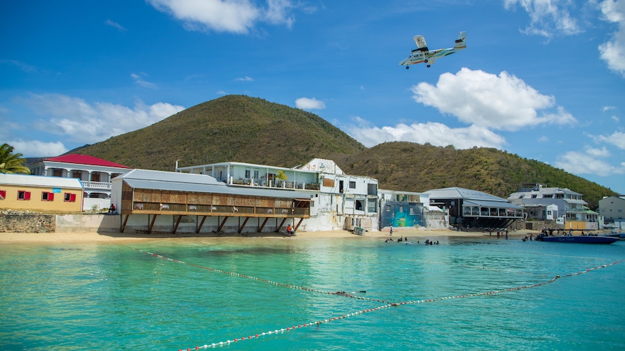 Grand Case which includes general coastal views, a coastal town and aircraft