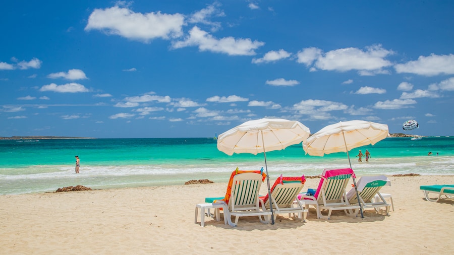 Orient Bay Beach featuring a sandy beach, tropical scenes and general coastal views