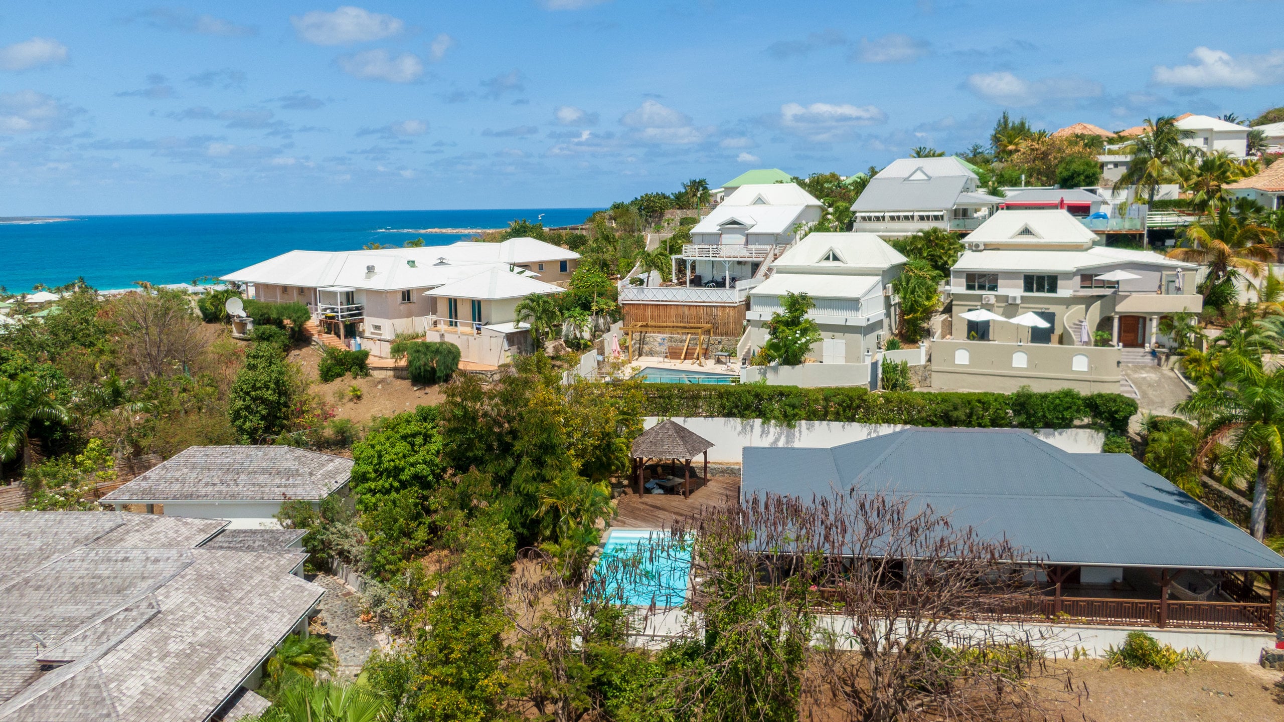 Orient Bay showing a coastal town, landscape views and general coastal views