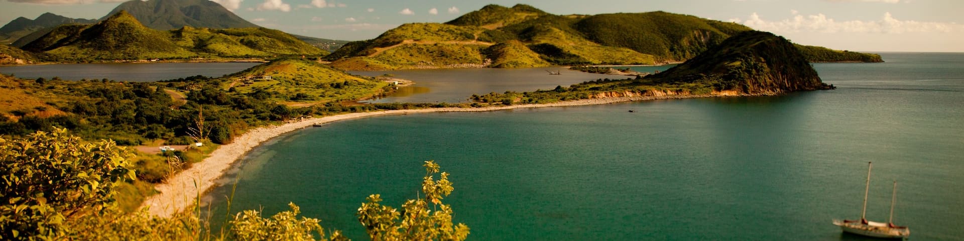 St. Kitts and Nevis showing landscape views, a sunset and general coastal views