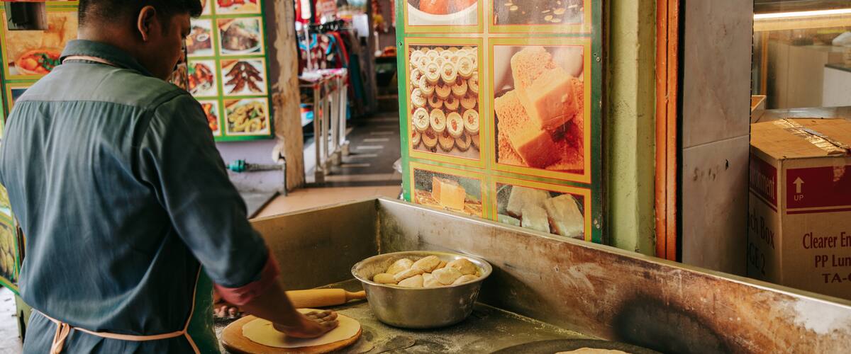 Brickfields which includes food and markets as well as an individual male