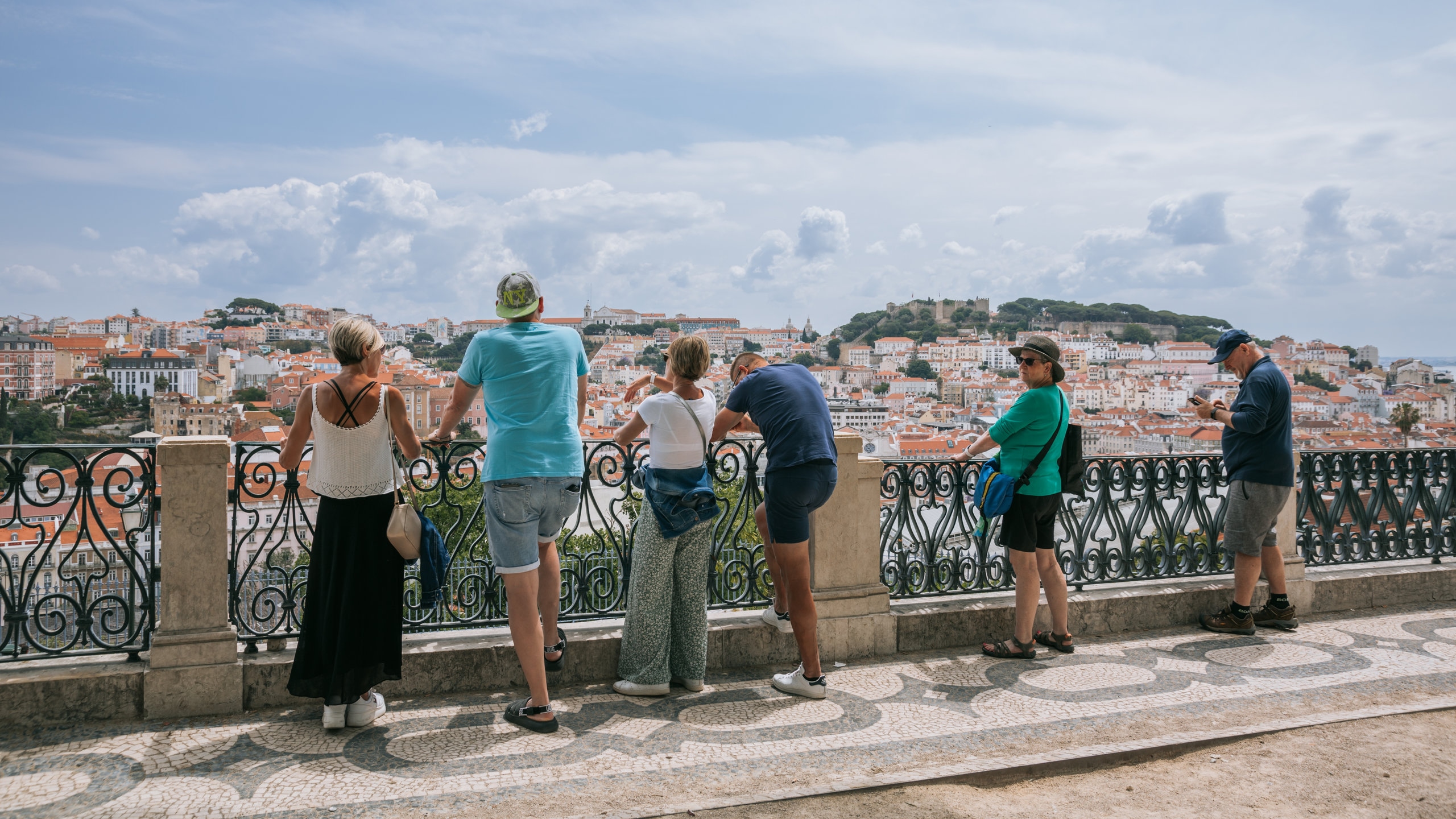 Bairro Alto showing a city and views as well as a small group of people